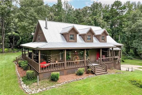 16.6 Acres of Land with Home for Sale in Opelika, Alabama