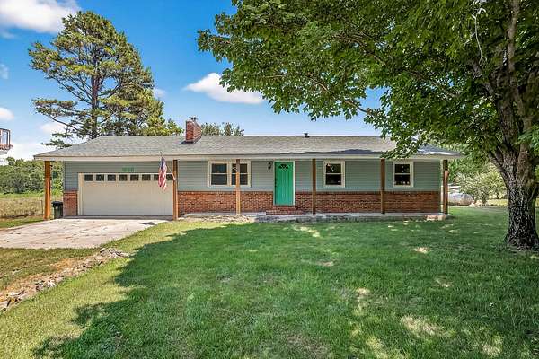 20.3 Acres of Agricultural Land with Home for Sale in Rogersville, Missouri