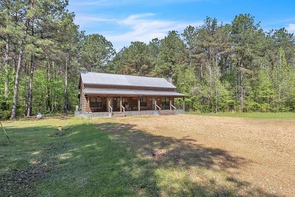 448 Acres of Recreational Land with Home for Sale in Caledonia, Mississippi