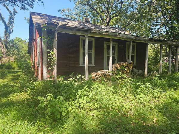 10.4 Acres of Land with Home for Sale in Mountain View, Missouri