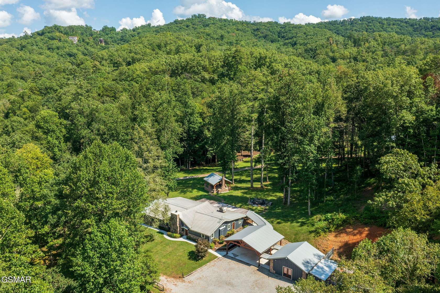 174 Acres of Recreational Land with Home for Sale in Walland, Tennessee