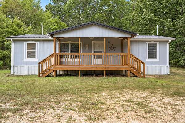 6.12 Acres of Residential Land with Home for Sale in Hohenwald, Tennessee