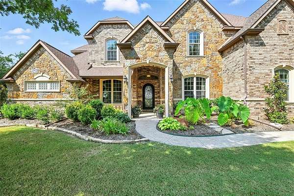 5 Acres of Residential Land with Home for Sale in Rhome, Texas