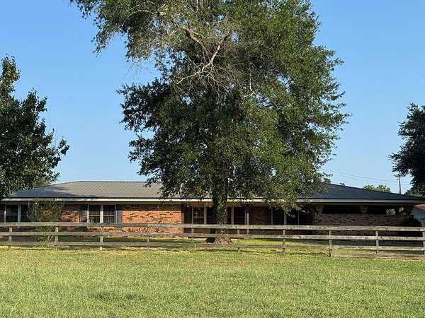 5 Acres of Residential Land with Home for Sale in Shelbyville, Texas