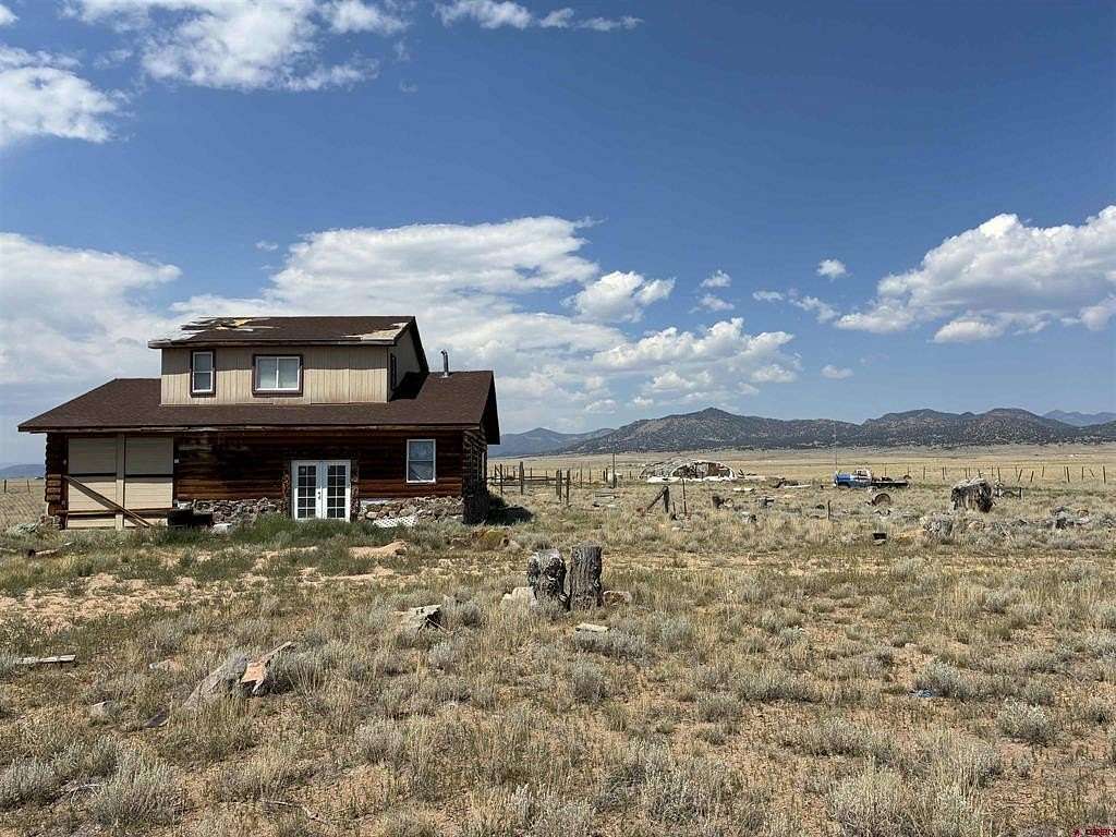 10 Acres of Residential Land with Home for Sale in Moffat, Colorado