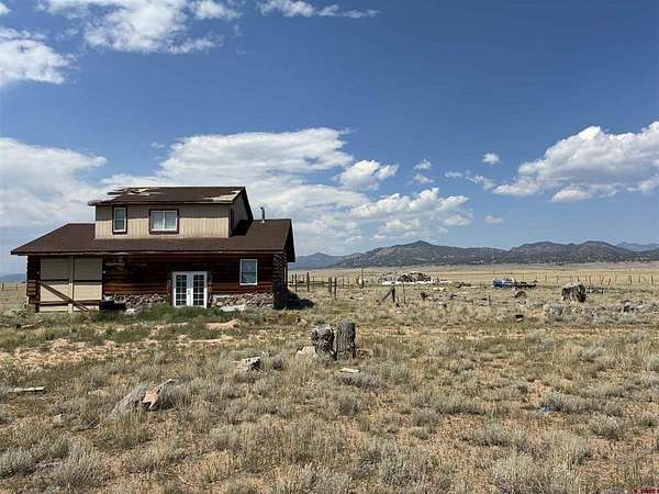 10 Acres of Residential Land with Home for Sale in Moffat, Colorado
