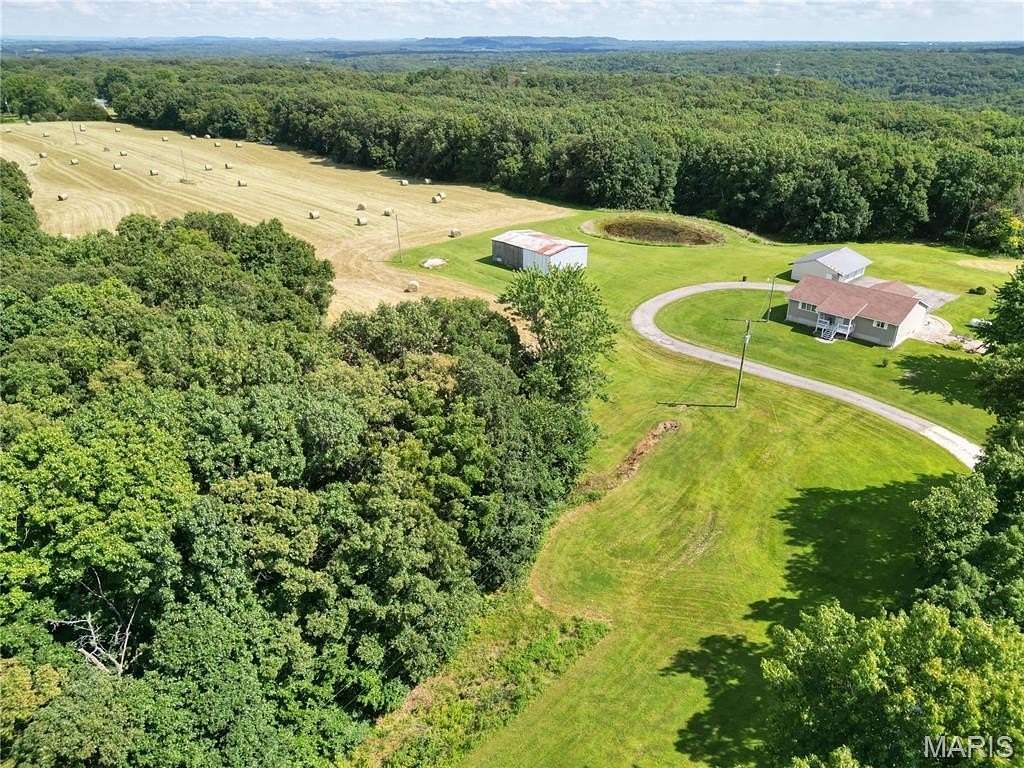 40 Acres of Land with Home for Sale in Bowling Green, Missouri