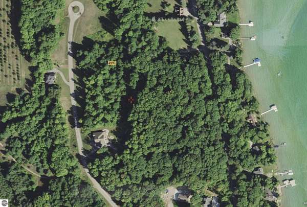 0.89 Acres of Land for Sale in Kewadin, Michigan