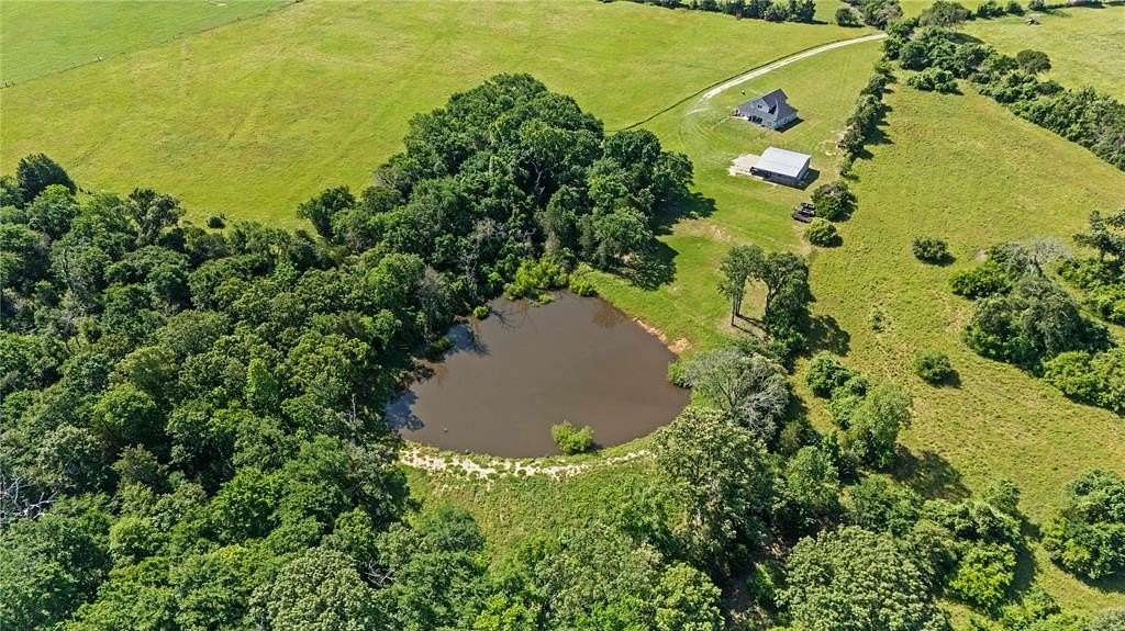 26.9 Acres of Agricultural Land with Home for Sale in Tennessee Colony, Texas