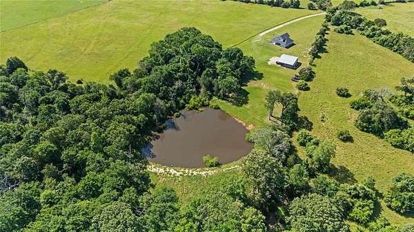 26.9 Acres of Agricultural Land with Home for Sale in Tennessee Colony, Texas