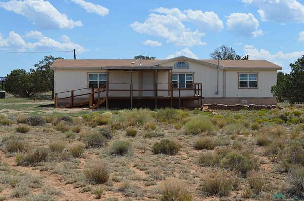 5 Acres of Residential Land with Home for Sale in Pinehill, New Mexico