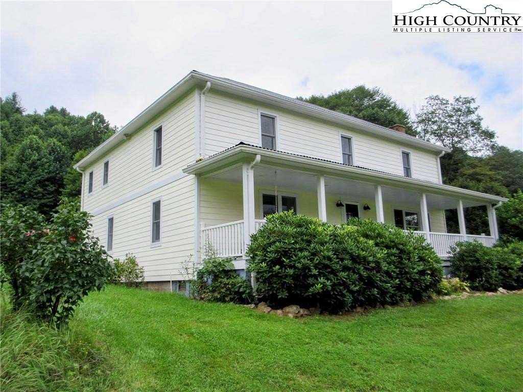 27.5 Acres of Land with Home for Sale in Lansing, North Carolina