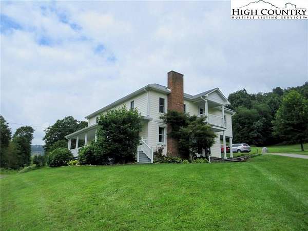 29.3 Acres of Recreational Land with Home for Sale in Lansing, North Carolina
