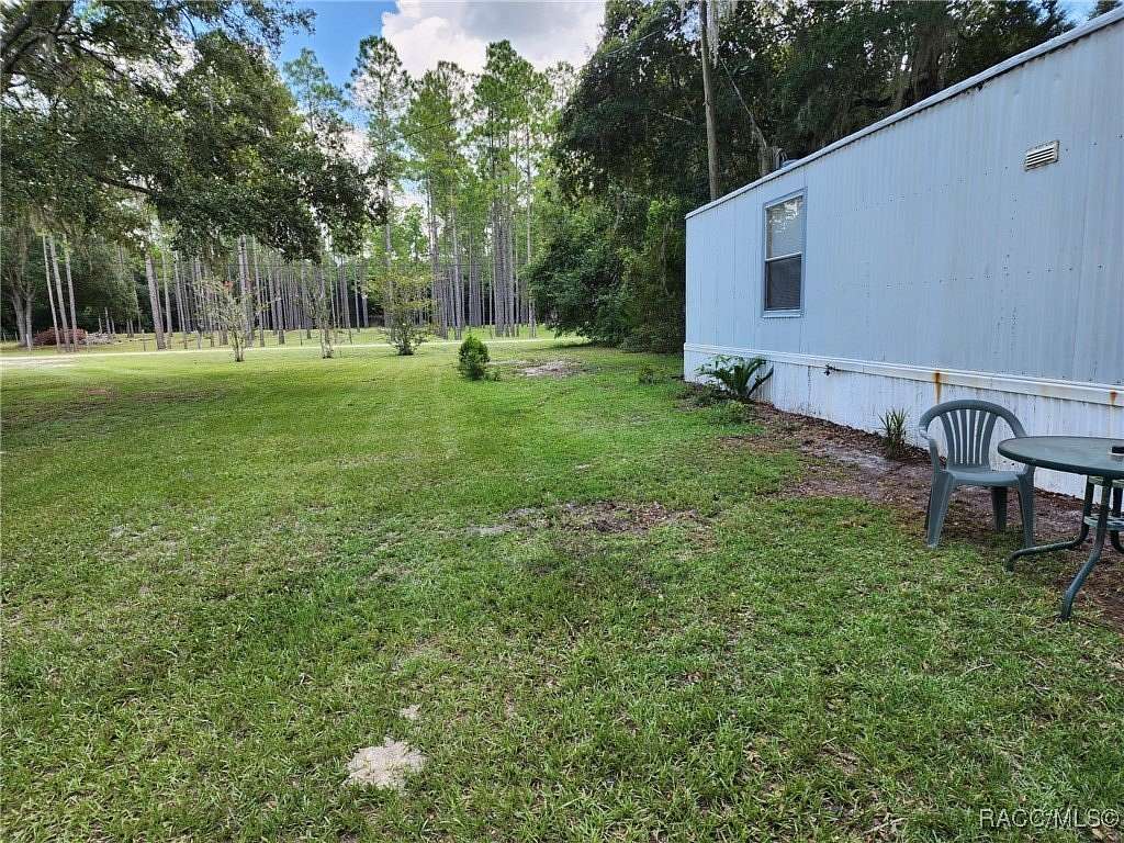 4.36 Acres of Residential Land with Home for Sale in Chiefland, Florida