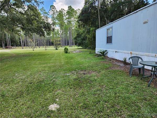 4.36 Acres of Residential Land with Home for Sale in Chiefland, Florida