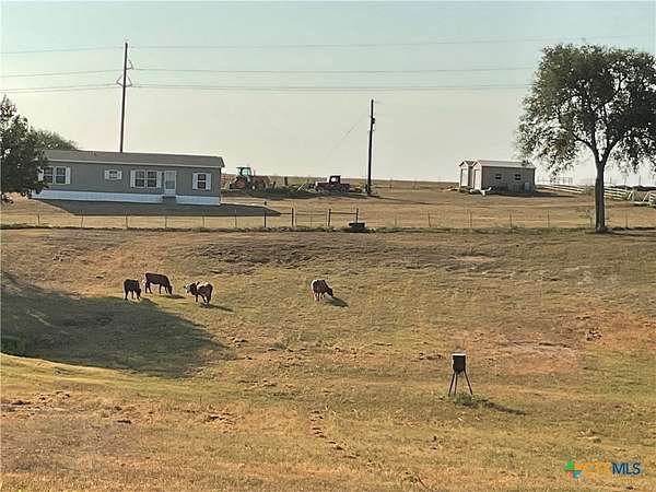 20 Acres of Agricultural Land with Home for Sale in Cuero, Texas