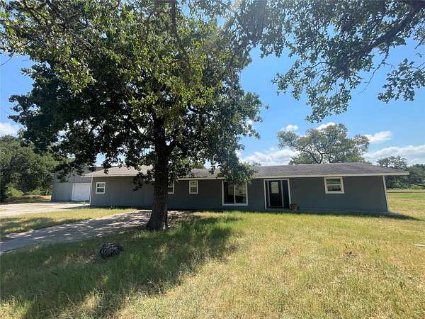 10 Acres of Land with Home for Sale in Cedar Creek, Texas