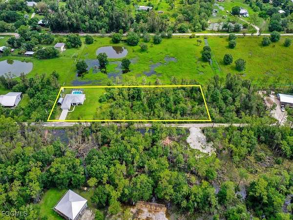 2 Acres of Residential Land with Home for Sale in North Fort Myers, Florida