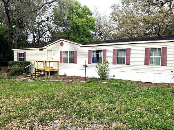 3.87 Acres of Residential Land with Home for Sale in Spring Hill, Florida