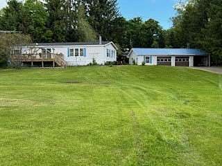 1.17 Acres of Land with Home for Sale in Sherburne, New York