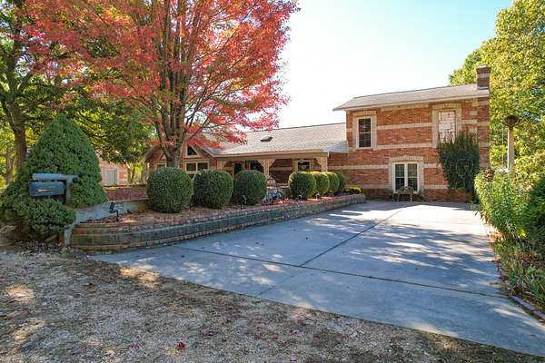 41.2 Acres of Agricultural Land with Home for Sale in Wyandotte, Oklahoma