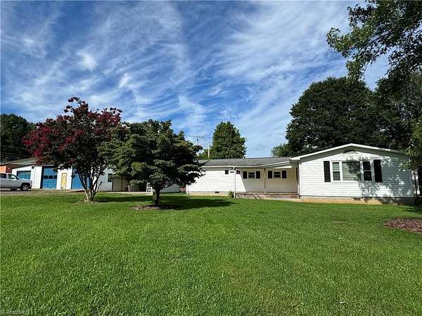 3.6 Acres of Residential Land with Home for Sale in Traphill, North Carolina