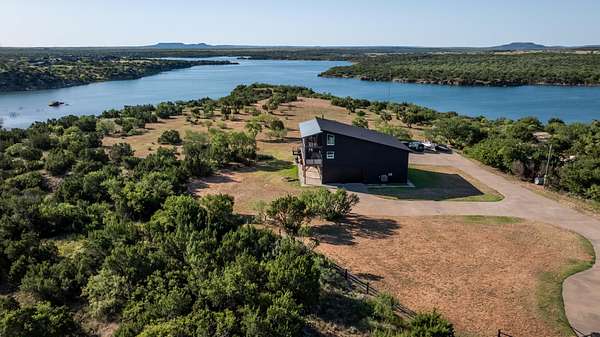 6.79 Acres of Residential Land with Home for Sale in Justiceburg, Texas