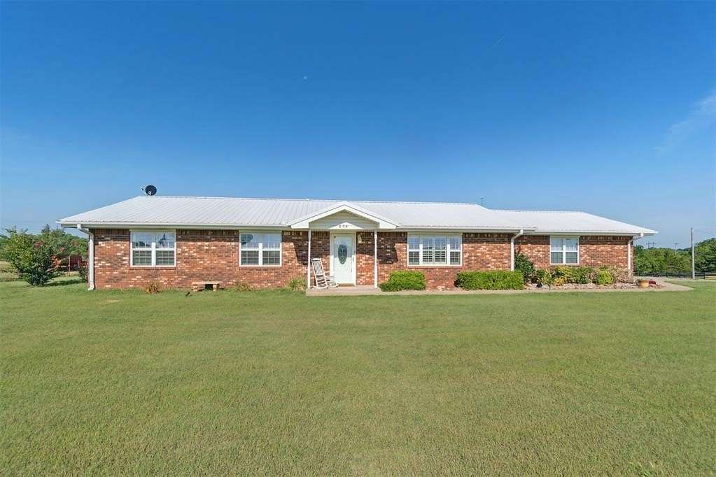 9 Acres of Residential Land with Home for Sale in Carney, Oklahoma