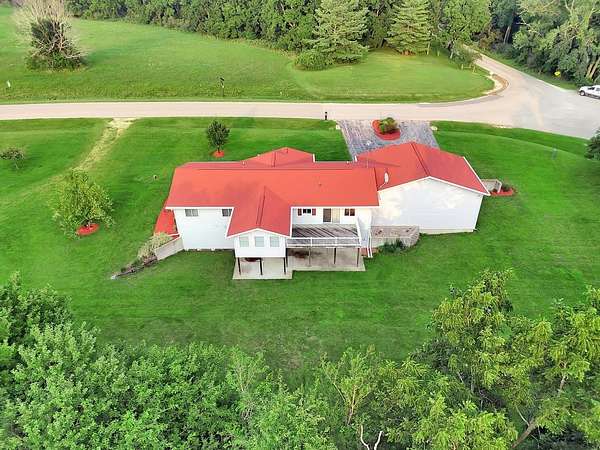 5 Acres of Land with Home for Sale in Lanark, Illinois