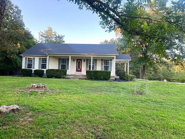 24.6 Acres of Recreational Land with Home for Sale in Atwood, Tennessee