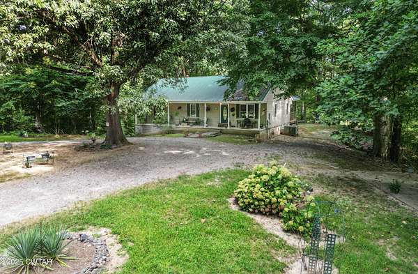 4.5 Acres of Residential Land with Home for Sale in Dyersburg, Tennessee