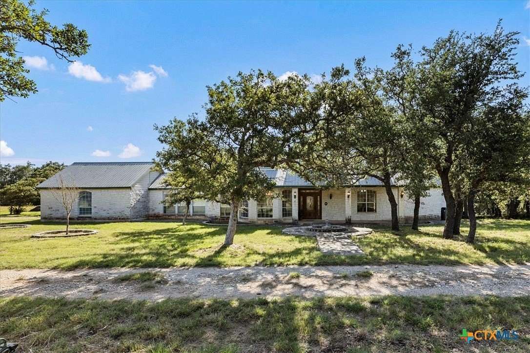 17.7 Acres of Land with Home for Sale in Dripping Springs, Texas