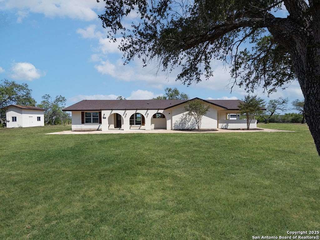 5 Acres of Residential Land with Home for Sale in Stockdale, Texas