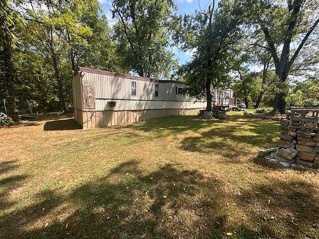 6.8 Acres of Residential Land with Home for Sale in Mountain View, Missouri