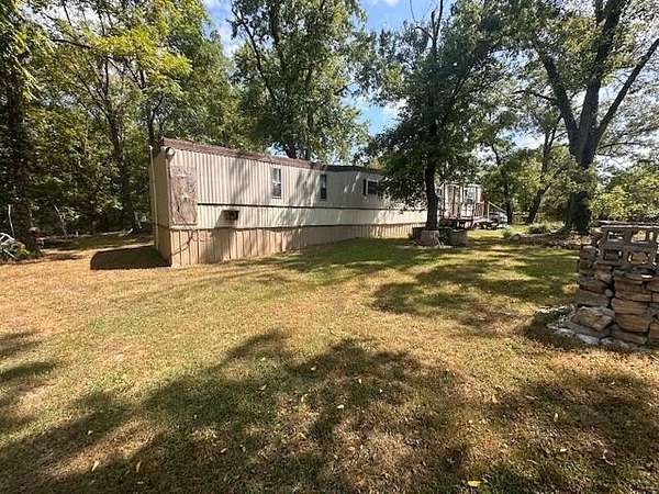 6.8 Acres of Residential Land with Home for Sale in Mountain View, Missouri