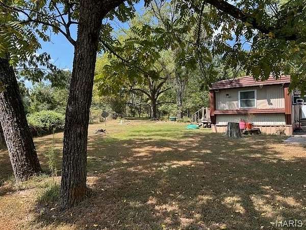 6.8 Acres of Land with Home for Sale in Mountain View, Missouri