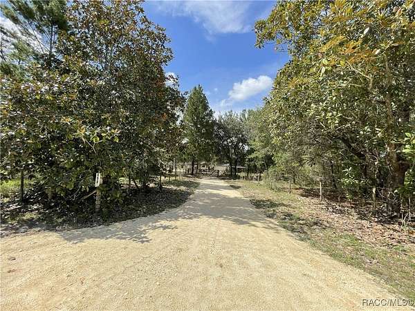 2.64 Acres of Residential Land with Home for Sale in Dunnellon, Florida