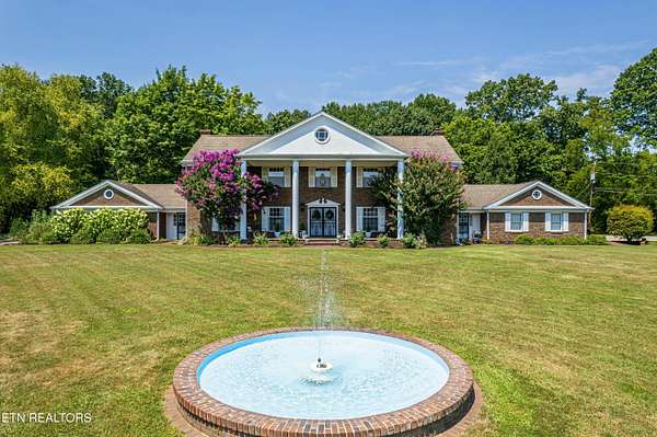 4.4 Acres of Residential Land with Home for Sale in Knoxville, Tennessee