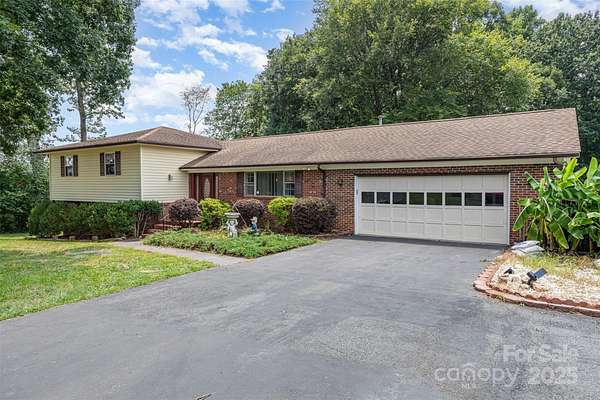 4.8 Acres of Residential Land with Home for Sale in Huntersville, North Carolina