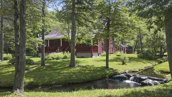 19.7 Acres of Recreational Land with Home for Sale in East Jordan, Michigan