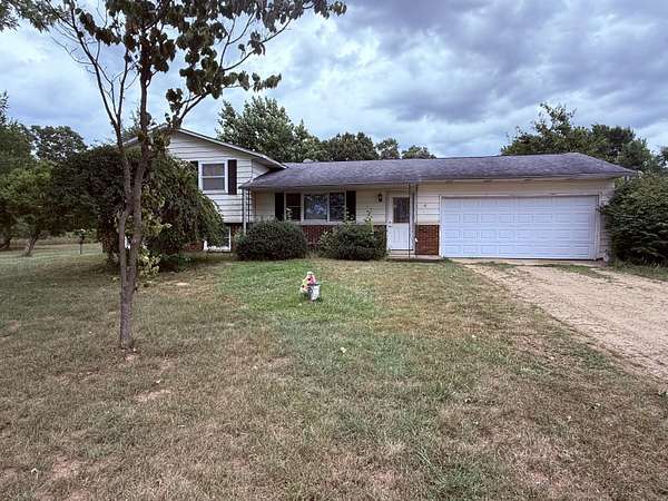 40 Acres of Land with Home for Sale in Three Rivers, Michigan