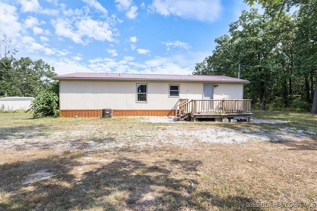 5 Acres of Residential Land with Home for Sale in Warsaw, Missouri