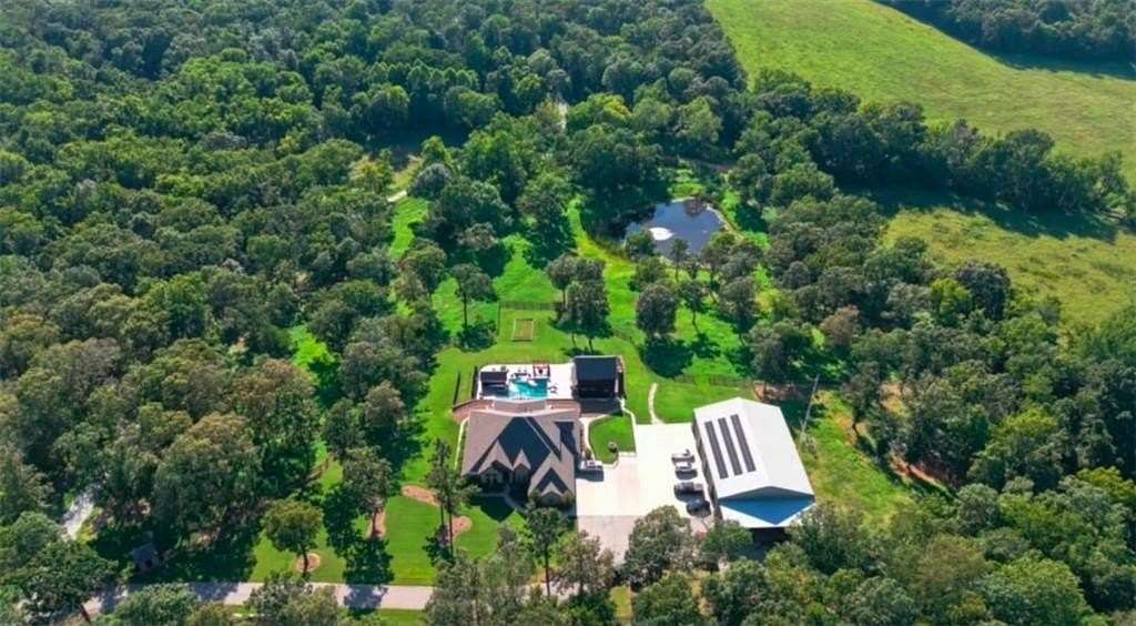 19.8 Acres of Land with Home for Sale in Gravette, Arkansas