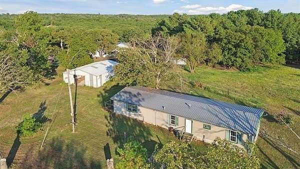 5 Acres of Residential Land with Home for Sale in Henryetta, Oklahoma