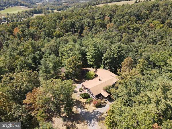 11.4 Acres of Land with Home for Sale in Delray, West Virginia