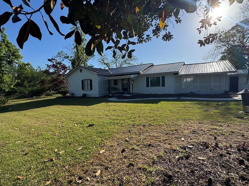 12.2 Acres of Recreational Land with Home for Sale in West Green, Georgia