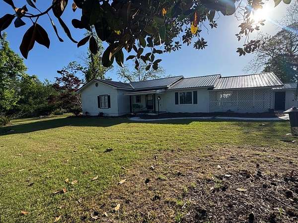 12.2 Acres of Recreational Land with Home for Sale in West Green, Georgia