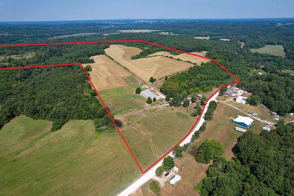 156 Acres of Land with Home for Sale in Marshfield, Missouri