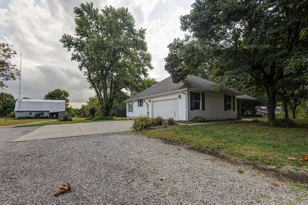 11.4 Acres of Land with Home for Sale in Billings, Missouri