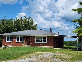 1.56 Acres of Residential Land with Home for Sale in Moss, Tennessee